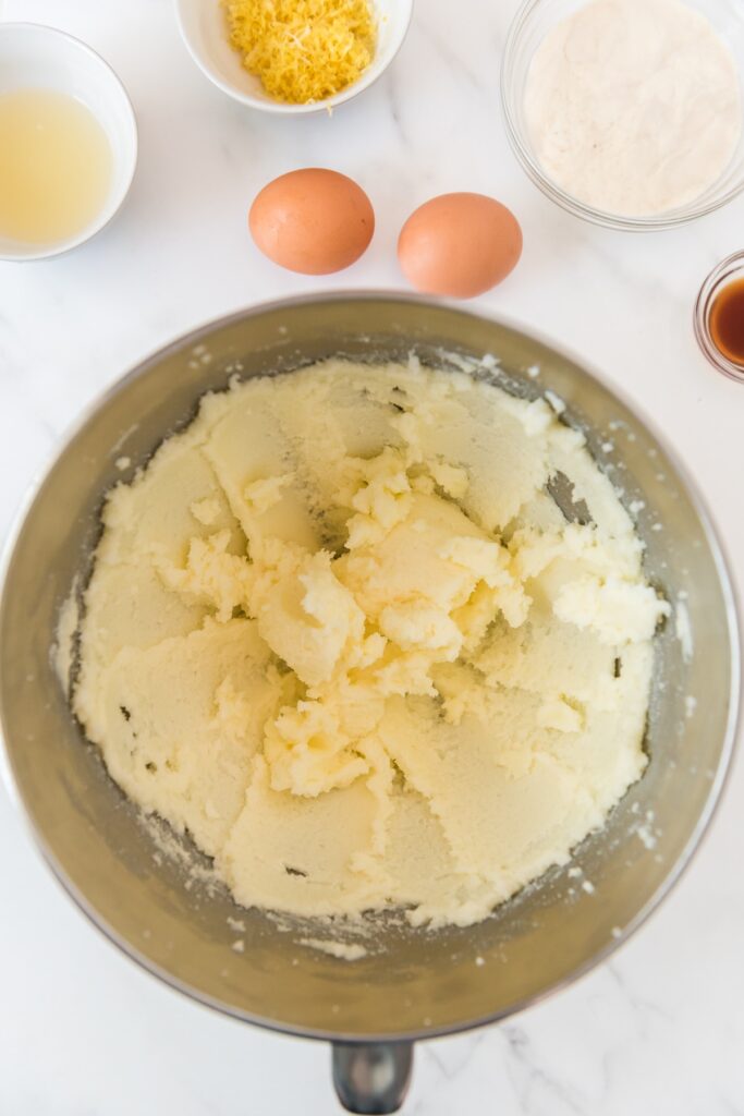 creaming butter and sugar in mixing bowl