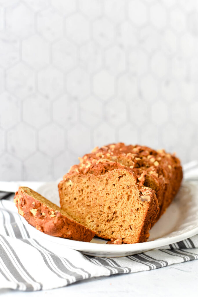 sourdough pumpkin bread on white platter
