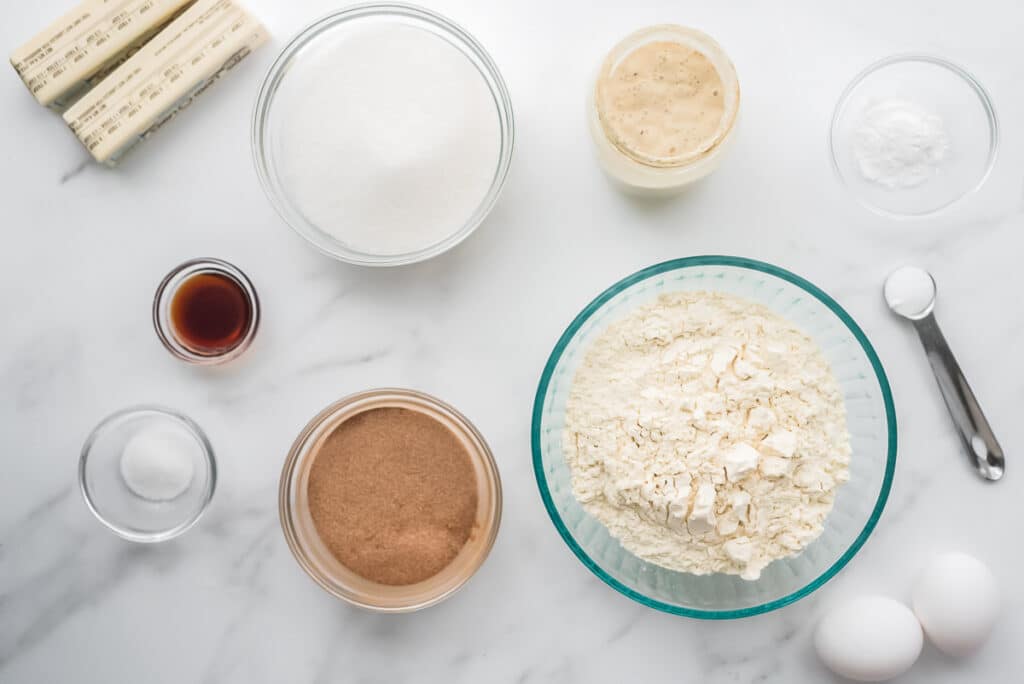 overhead view of ingredients for cookies on marble counter