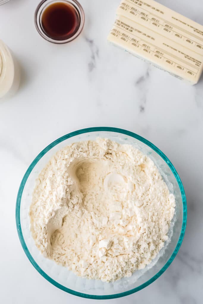 overhead view of glass mixing bowl with dry ingredients mixed