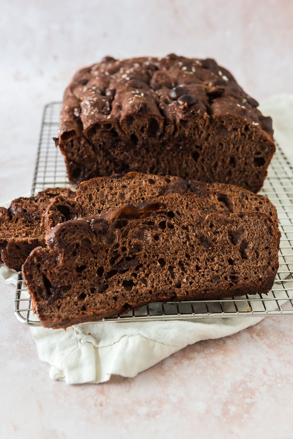 Sourdough Chocolate Focaccia slices stacked in front of loaf