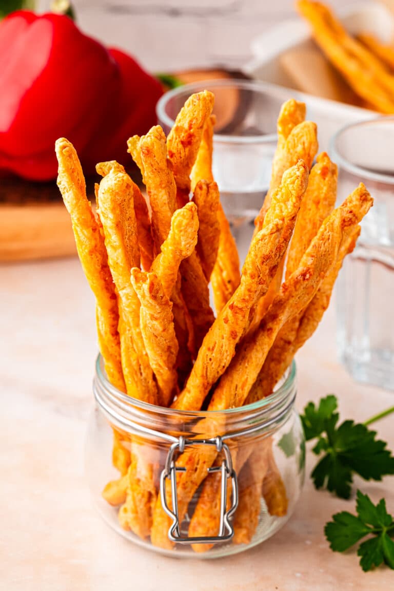 cheese straws in a glass jar
