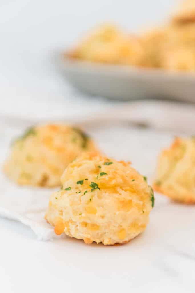 closeup of discard drop biscuit with more in background