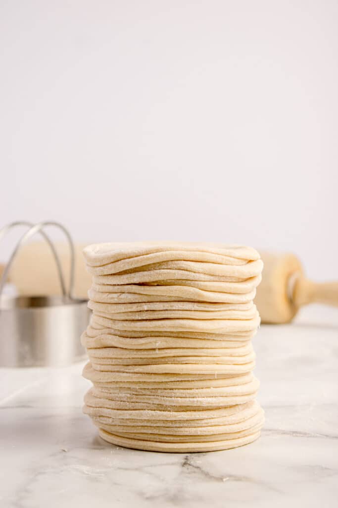 stack of dumpling wrappers cut and stacked together