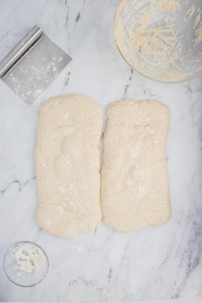 sourdough ciabatta dough split into two loaves