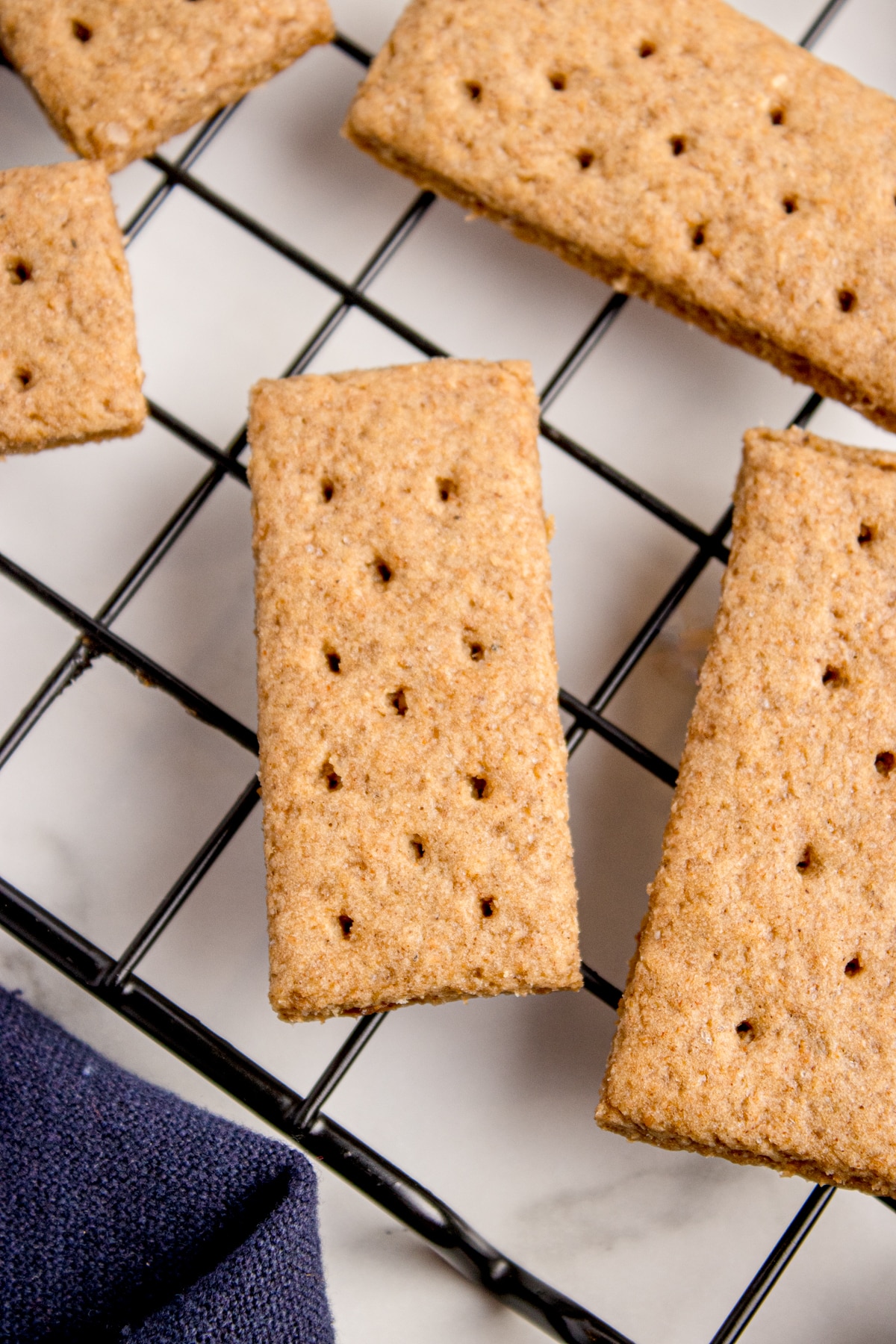sourdough graham crackers on a wire rack