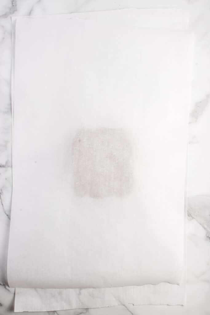 dough under parchment paper