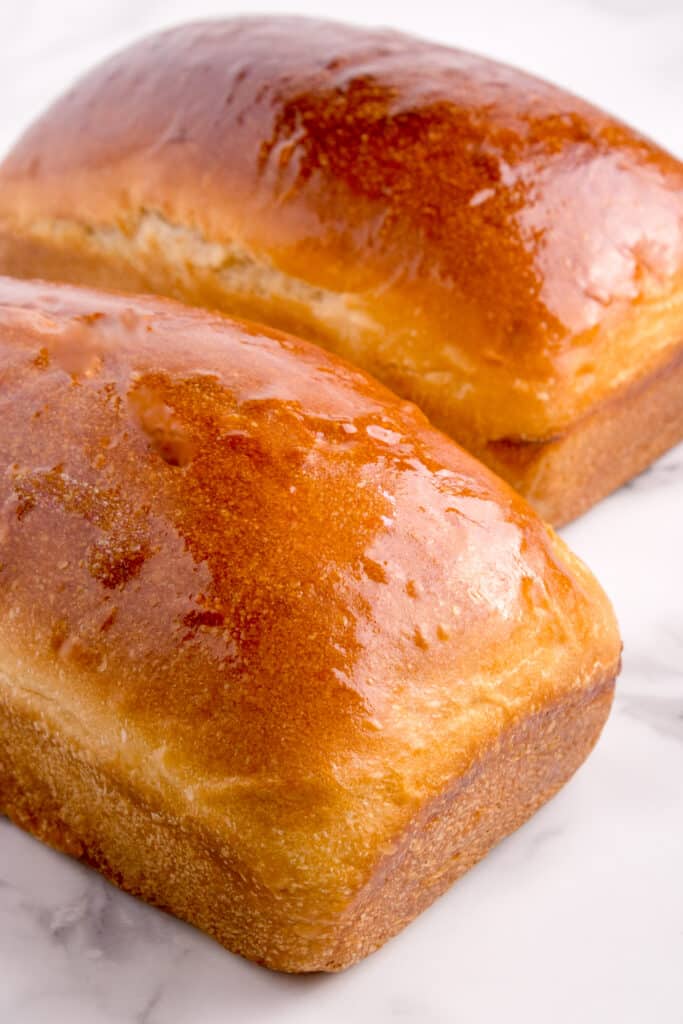 two loaves of potato flakes sandwich bread side by side