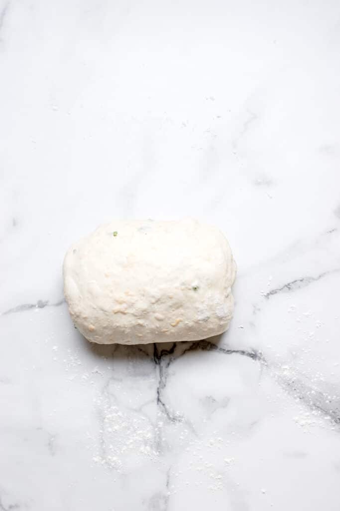sourdough bread dough shaped into log