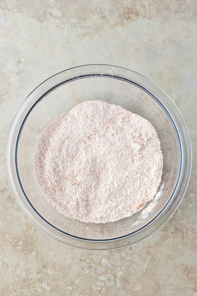 glass mixing bowl with dry ingredients for cookies