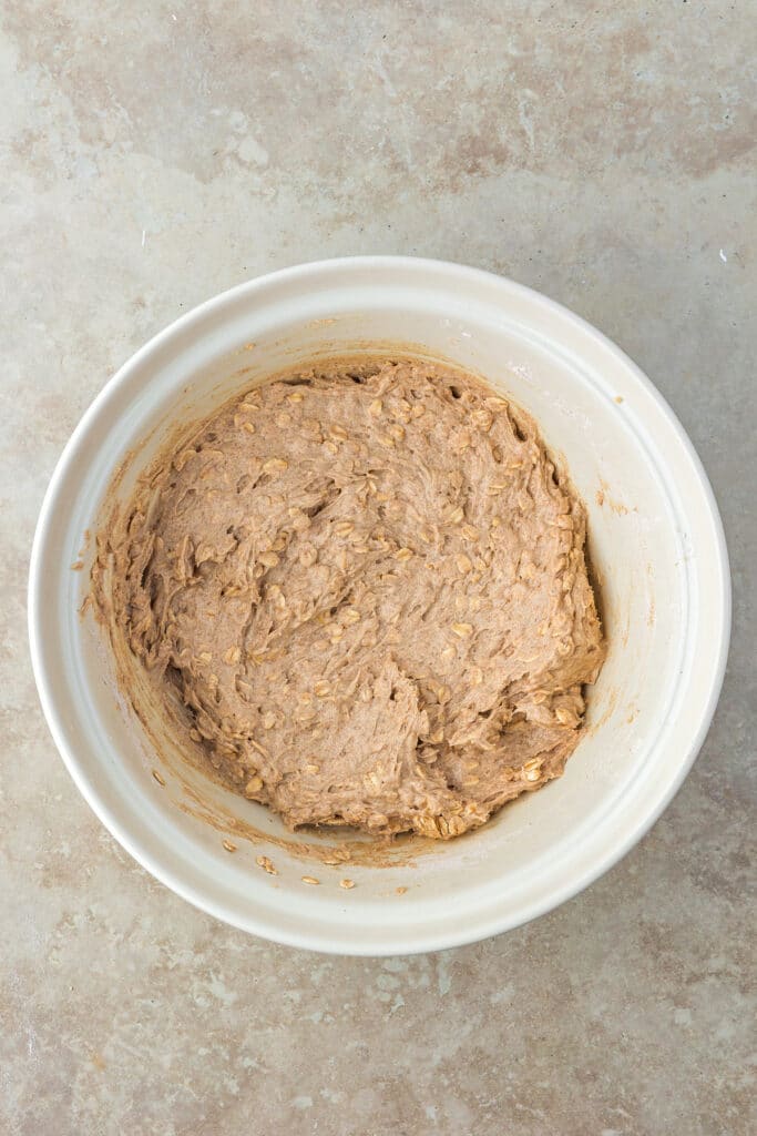 mixing bowl with mixed dough for oatmeal cream pies