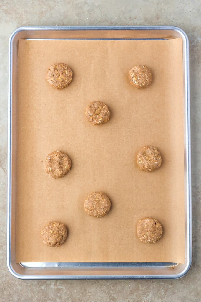 balls of cookie dough for oatmeal cream pies on baking tray
