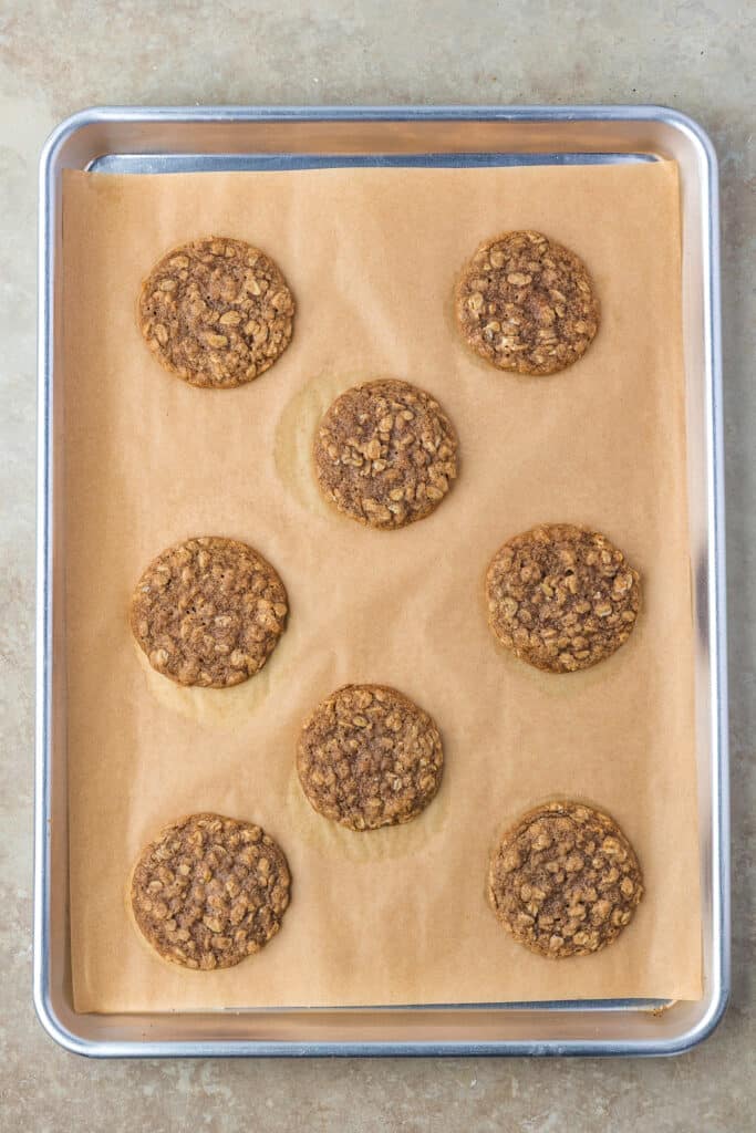 freshly baked oatmeal cookies on baking tray