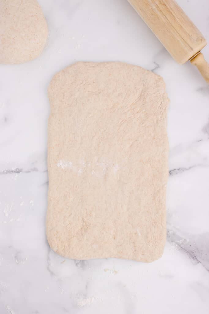 rolling dough into rectangle