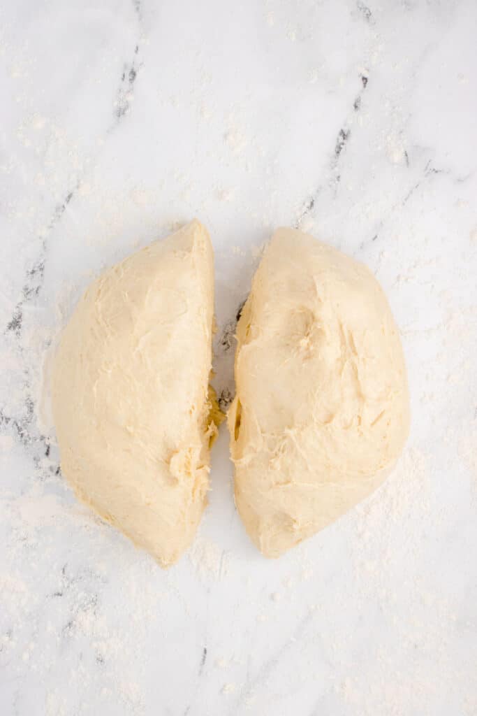 ball of dough divided in half