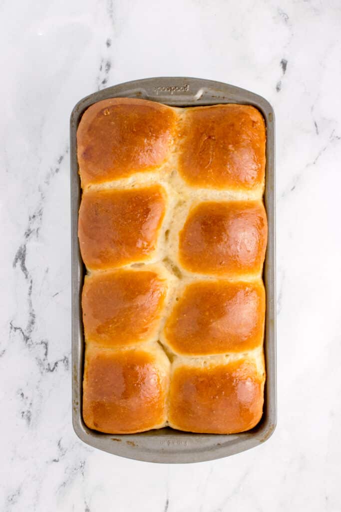 freshly baked sourdough brioche in metal loaf pan