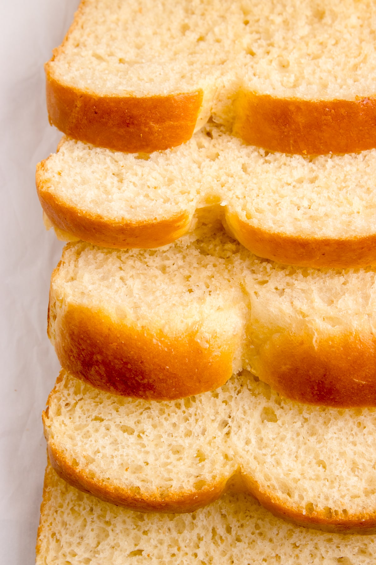 sourdough brioche sliced and stacked on top of each other