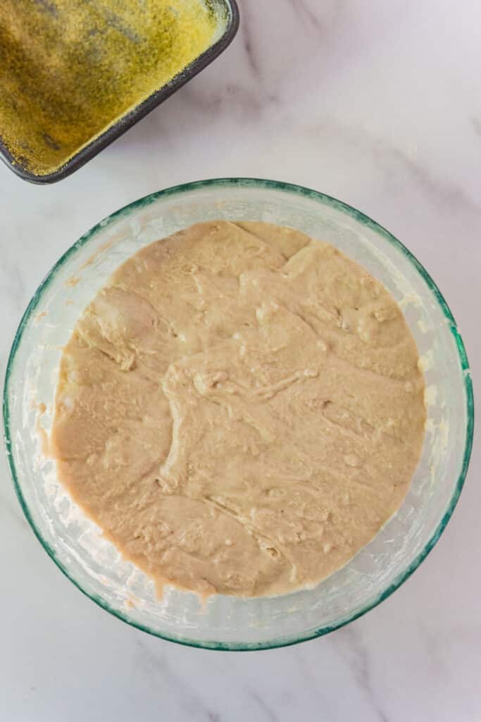 mixing bowl with dough for sourdough English muffin bread