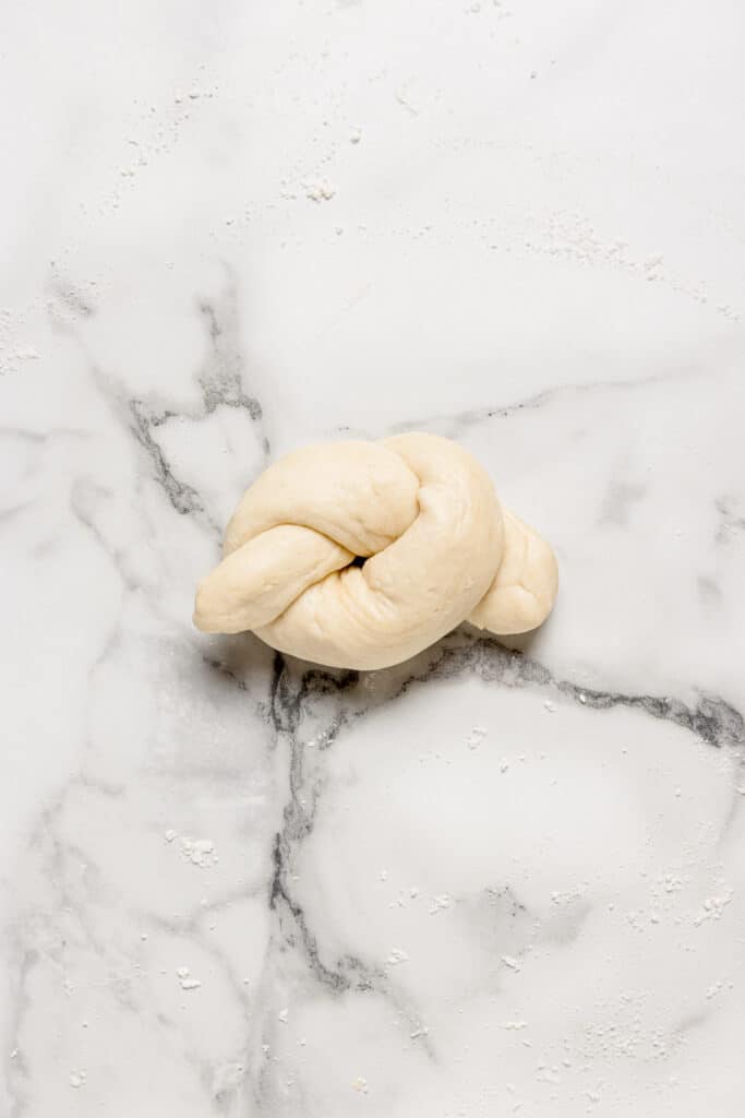 sourdough garlic knot shaped before baking