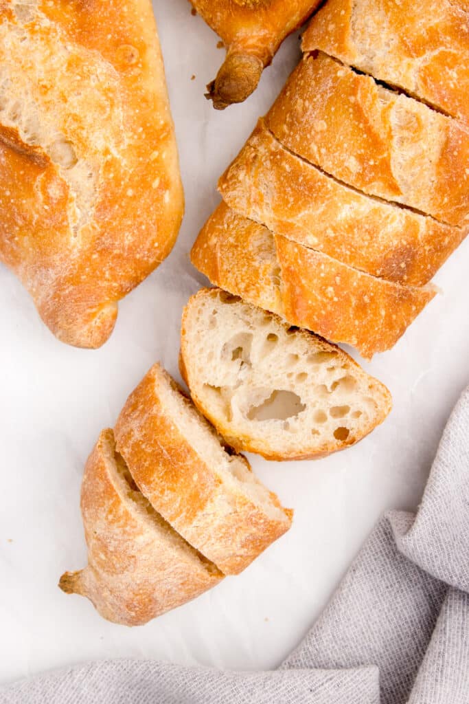 sourdough baguette sliced into thin slices and stacked together