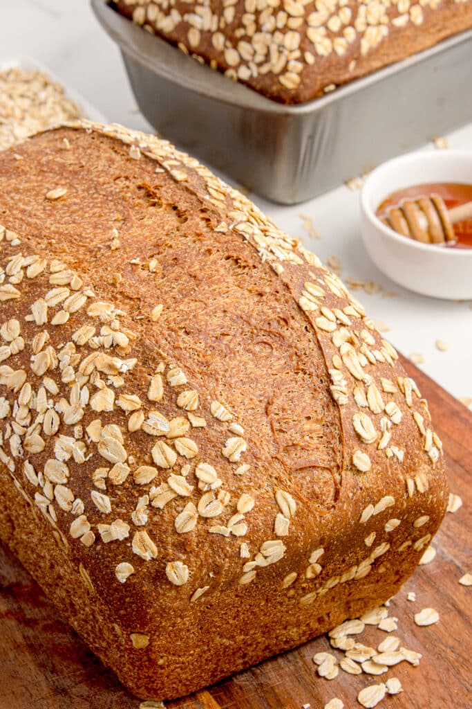 loaf of sourdough brown bread topped with oats