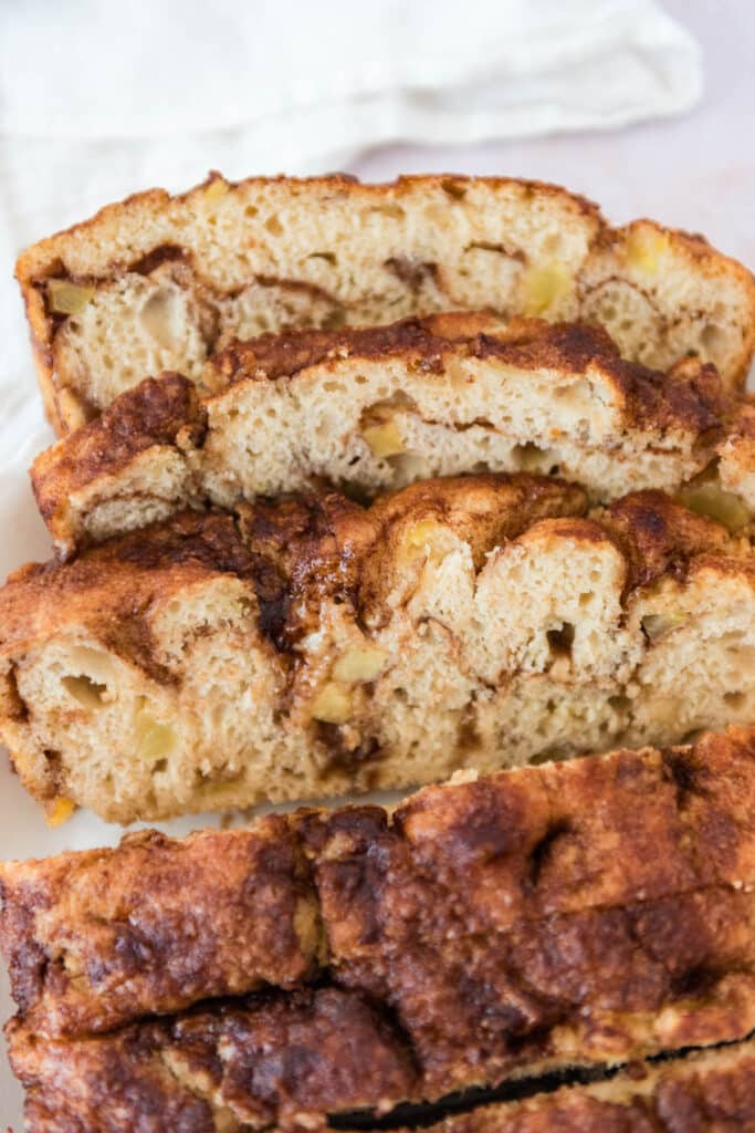 apple cinnamon sourdough focaccia slices arranged on white platter