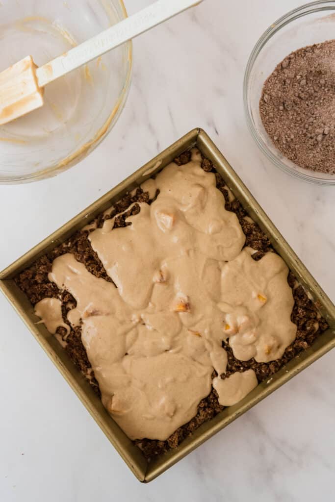 square baking pan with coffee cake and toppings