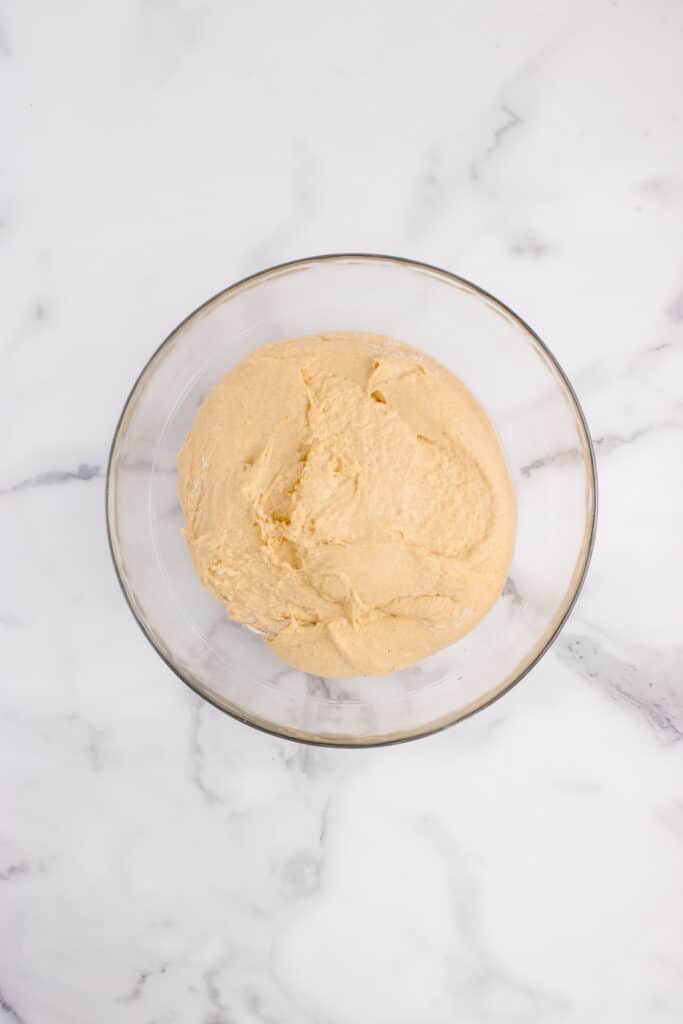 glass mixing bowl with sourdough pumpkin dough
