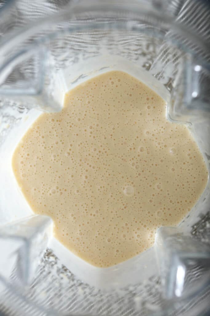 inside of blender showing sourdough crepe batter